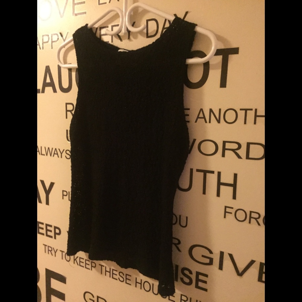 Black crochet-like design tank.